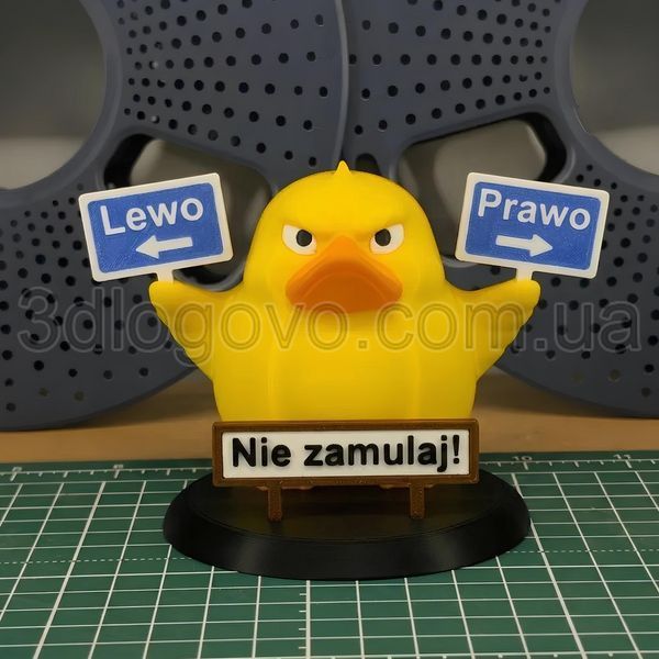 Kaczka &bdquo;Lewo/Prawo, Nie tępi się!&rdquo; do auta &mdash; zabawka na deskę rozdzielczą