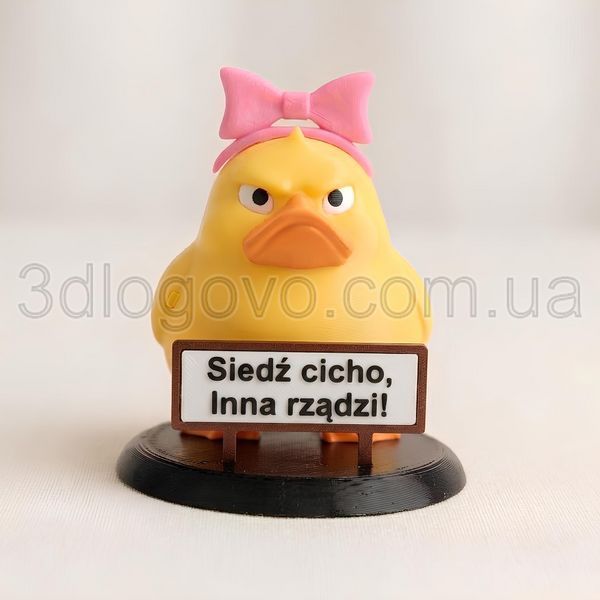Angry duck with a bow for car dashboard